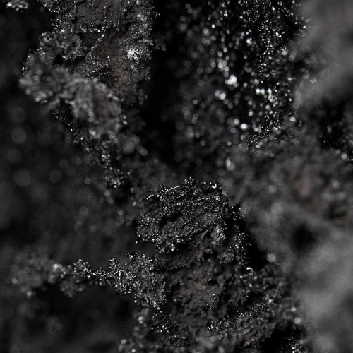 Retained-carbon material
